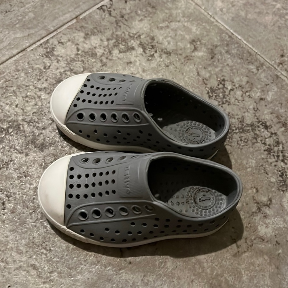 Native slip on gray shoes. Size C5.